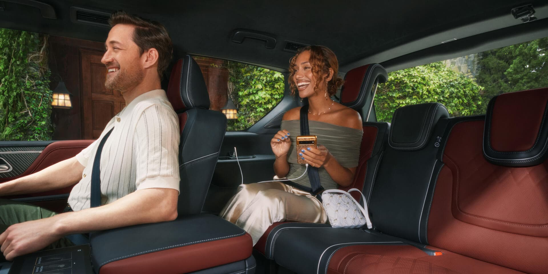 People sitting in INFINITI SUV models