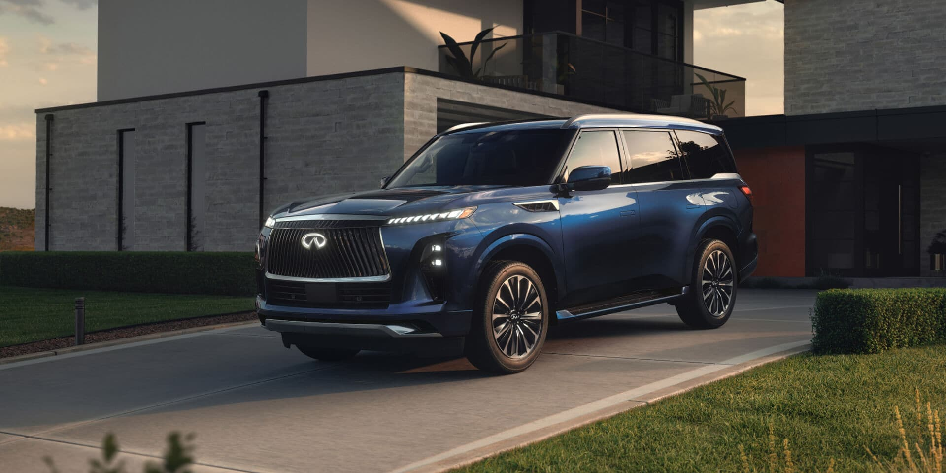 An INFINITI Certified Pre-Owned SUV parked in a driveway